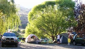 A picture of tent campers in Swiftwater RV Park.